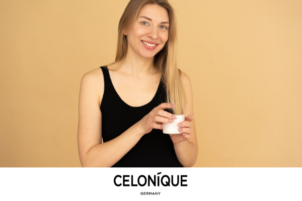 Woman holding a facial cream jar, with the CELONIQUE Germany logo beneath the photograph.