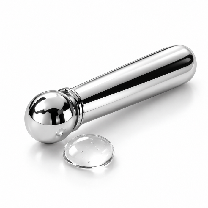 Generic chrome applicator and gel droplet on a white background